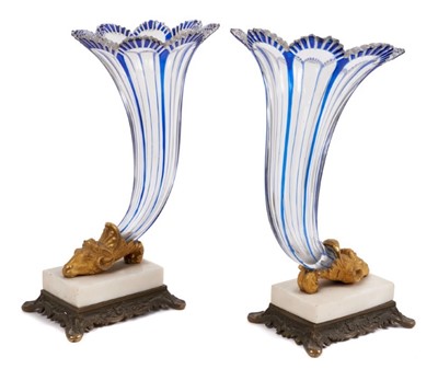 Lot 126 - A pair of mid 19th century Bohemian blue flash glass cornucopia, on parcel gilt bronze and marble bases