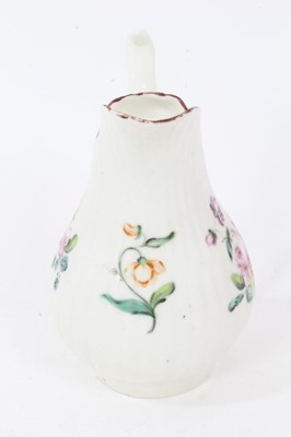 Lot 129 - A Derby fluted baluster shaped milk jug, circa 1760