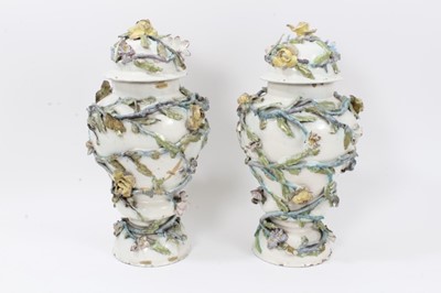 Lot 189 - A rare pair of Italian faience vases and covers, circa 1760
