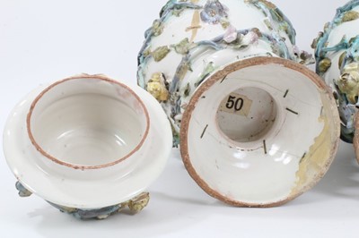Lot 143 - A rare pair of Italian faience vases and covers, circa 1760
