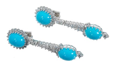 Lot 461 - Pair of diamond and turquoise pendant earrings, each with two oval turquoise cabochons and surrounded by brilliant cut diamonds in white gold setting. Estimated total diamond weight approximately 2...