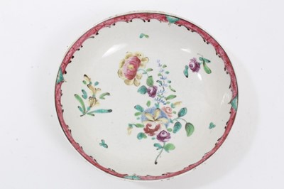 Lot 85 - Two Liverpool saucers, decorated in Chinese famille rose style