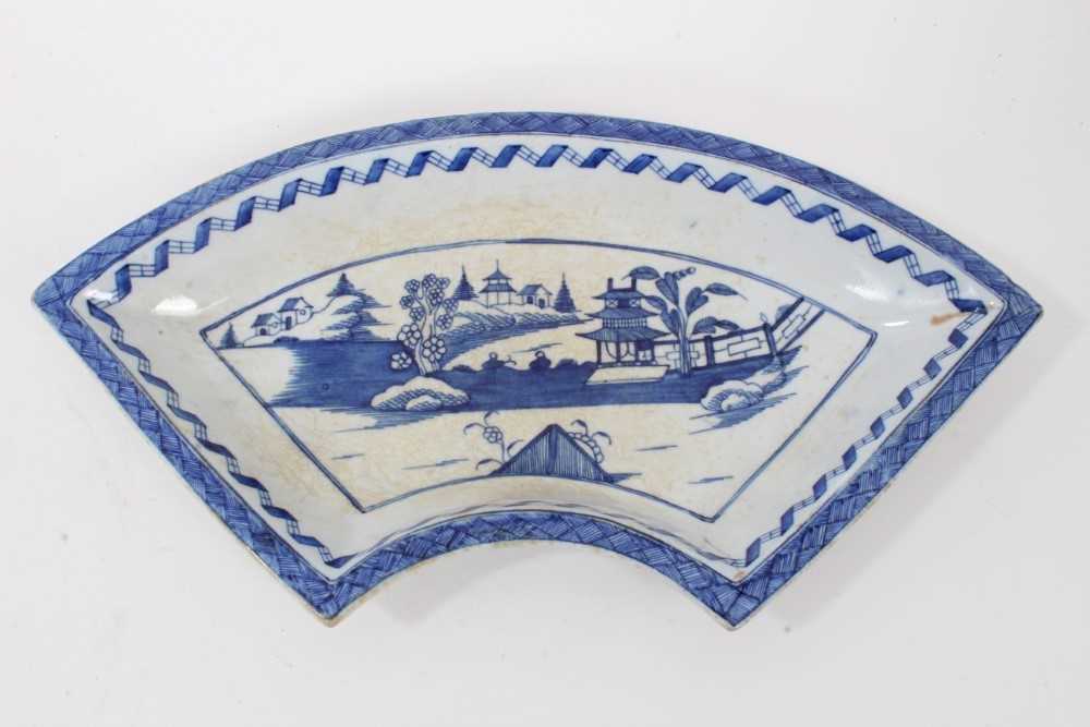 Lot 150 - A Bow crescent shaped dish, painted in blue in Chinese style, circa 1765