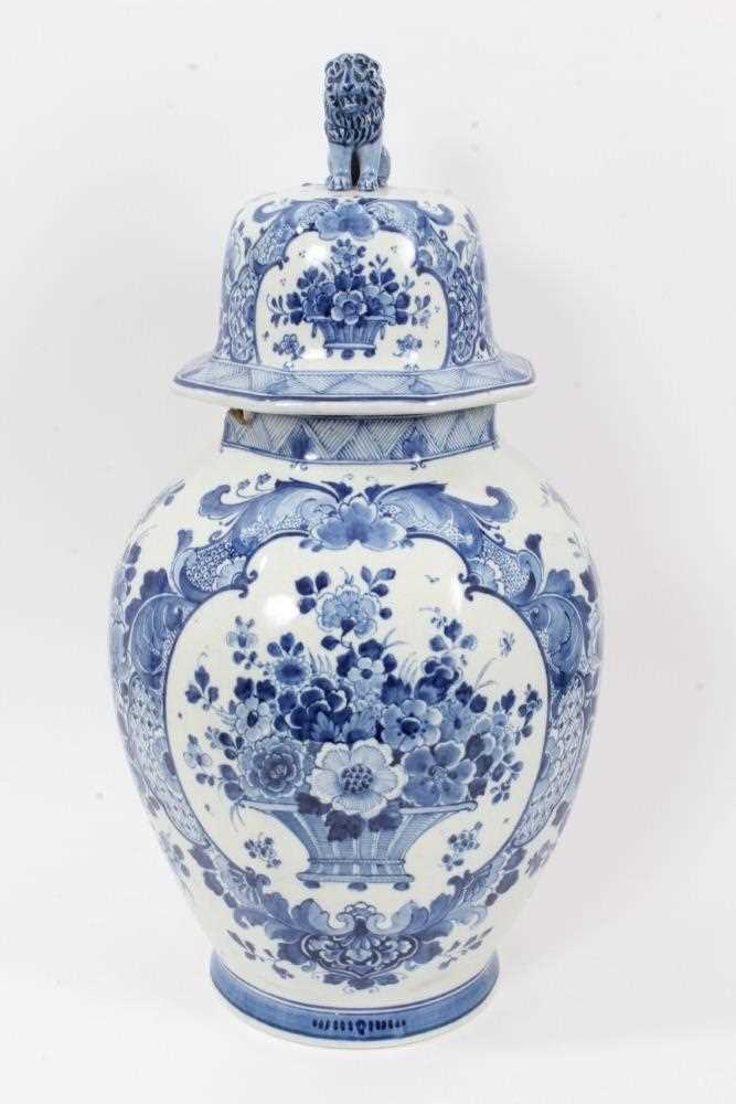 Lot 153 - A large Dutch Delft blue and white vase and cover