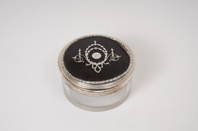 Lot 372 - A silver and tortoiseshell topped circular glass jar