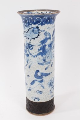 Lot 156 - A Chinese blue and white cylindrical crackle ground vase