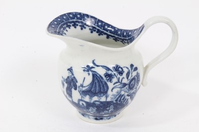 Lot 161 - An unusual Caughley helmet shaped milk jug, printed in blue with the Fisherman and Cormorant pattern, circa 1785