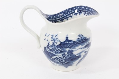 Lot 161 - An unusual Caughley helmet shaped milk jug, printed in blue with the Fisherman and Cormorant pattern, circa 1785