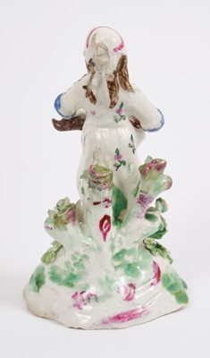 Lot 171 - An unusual English porcelain figure of a young girl, circa 1780-90
