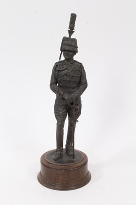 Lot 875 - A spelter figure of a Lancer, on wooden base