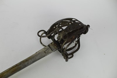 Lot 862 - Scottish basket hilt claymore type broad sword, with wire bound wooden grip, basket hilt and steel blade, in scabbard.