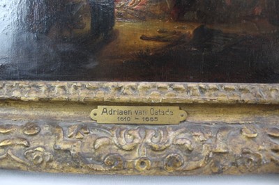 Lot 1201 - Circle of Adriaen Van Ostade (1610-1685) oil on panel - figures around a fire