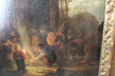 Lot 1201 - Circle of Adriaen Van Ostade (1610-1685) oil on panel - figures around a fire