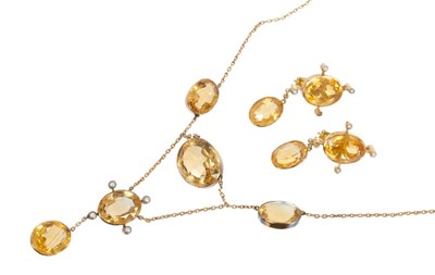 Lot 463 - Edwardian citrine and seed pearl necklace with oval mixed cut stones in gold rub over settings, together with a pair of pendant earrings.