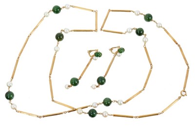 Lot 507 - Nephrite, cultured pearl and gold long chain and matching earrings with long tubular gold links, the earrings marked 750.