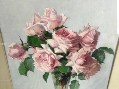 Lot 64 - John Ernest Foster (1877-1965) oil - roses in a glass vase, 30cm x 40cm