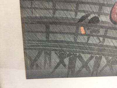 Lot 63 - Japanese colour woodblock, - figures on a bridge in rain 36.5cm x 16cm mounted in glazed frame