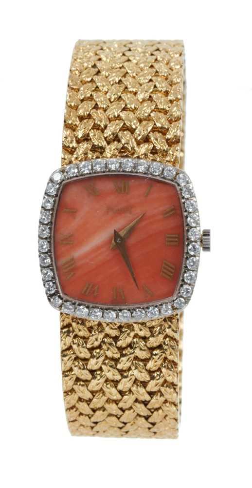 Lot 569 - Ladies Piaget 18ct gold and diamond wristwatch with coral dial, gold Roman numerals, diamond-set bezel on integral 18ct yellow gold woven bracelet, Birmingham import marks 1970. Case approximately...