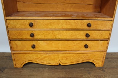 Lot 1440 - Regency style maple and painted open bookcase, with arched gallery and open shelves, three drawers below on shaped frieze, 92cm wide x 30cm deep x 130cm high