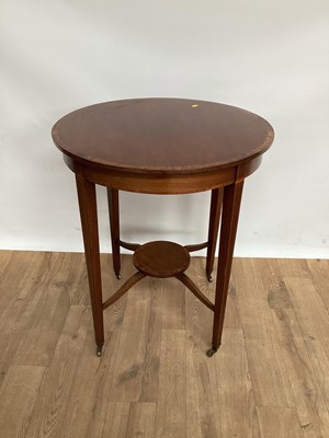 Lot 980 - Edwardian circular mahogany two tier occasional table