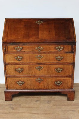 Lot 1443 - Mid 18th century walnut crossbanded bureau, with fitted interior and four graduated drawers on bracket feet, 91cm wide x 53cm deep x 110c, high