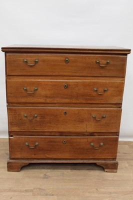 Lot 1361 - 18th century elm chest of four long drawers on bracket feet