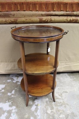 Lot 1459 - Edwardian mahogany three tier tray top occasional table, with removable glass tray and three circular tiers raised on square supports, 48cm diameter