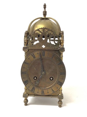 Lot 655 - 1930s Miniature brass lantern clock with French movement