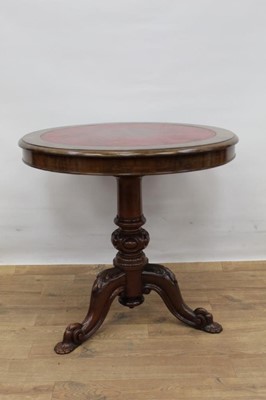 Lot 1497 - 19th century circular library table with leather insert to top, standing on good carved base