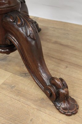 Lot 1497 - 19th century circular library table with leather insert to top, standing on good carved base