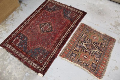 Lot 1534 - Persian rug, together with a small Heriz rug