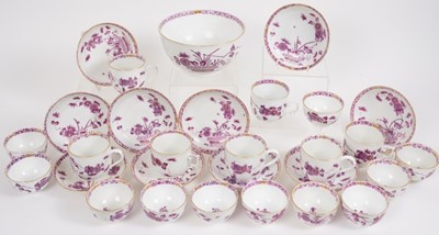 Lot 196 - 18th century Meissen fluted porcelain part tea set, of fluted form, decorated in purple enamel and gilt with a variation of the Indian Flowers pattern, crossed swords marks to bases (some with dot)...