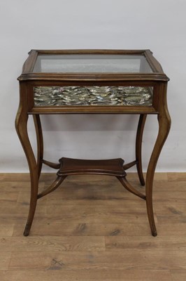 Lot 1024 - Early 20th century mahogany bijouterie table, with large collection of teaspoons