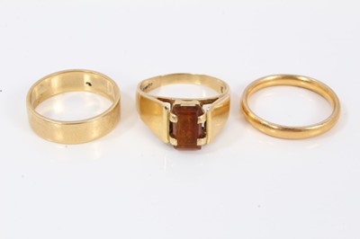 Lot 536 - 22ct gold wedding ring and two 18ct gold rings