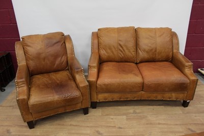 Lot 1514 - Modern leather three piece suite, with Art Deco outlines and close stud upholstery on square tapered legs