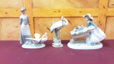 Lot 1208 - Seven Lladro and Nao porcelain figures