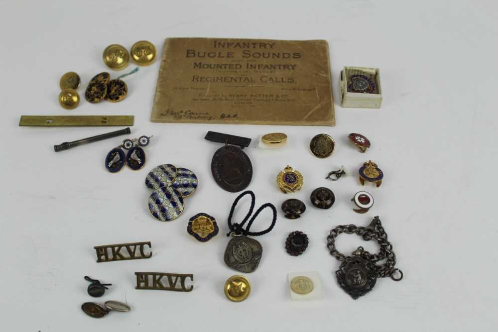 Lot 735 - Victorian Honourable Artillery Company badge together with a book of Infantry Bugle sounds and Regimental calls, together with other military badges and buttons.