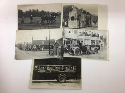 Lot 1426 - Postcards in large album including real photographic animated street scenes and shop fronts