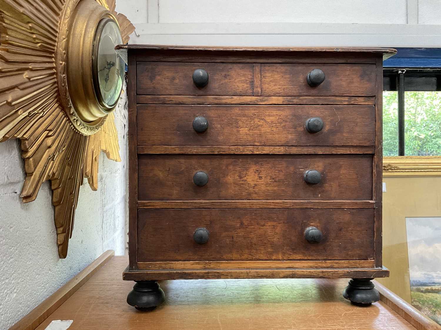 Lot 142 - Early 20th century oak miniature chest of drawers