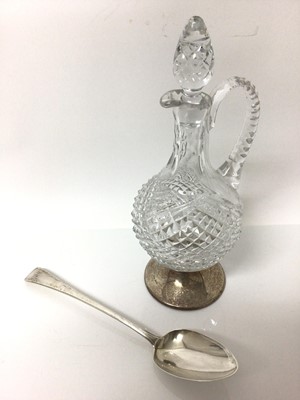 Lot 19 - 19th century silver basting spoon, together with a silver footed decanter
