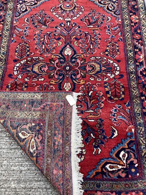 Lot 1446 - Iranian woolen carpet