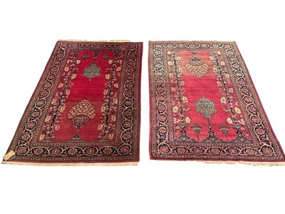 Lot 1480 - Fine pair of pink ground Pakistani Kashan design rugs
