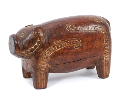 Lot 792 - Massim culture Milne Bay Papua New Guinea carved wood pig with incised decoration inlaid with lime, late 19thc. / early 20thc.