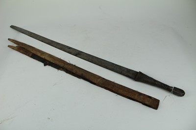 Lot 887 - Antique Eastern sword with wirebound silver grip and silver pommel, with tapered steel blade, blade  80.5cm in length