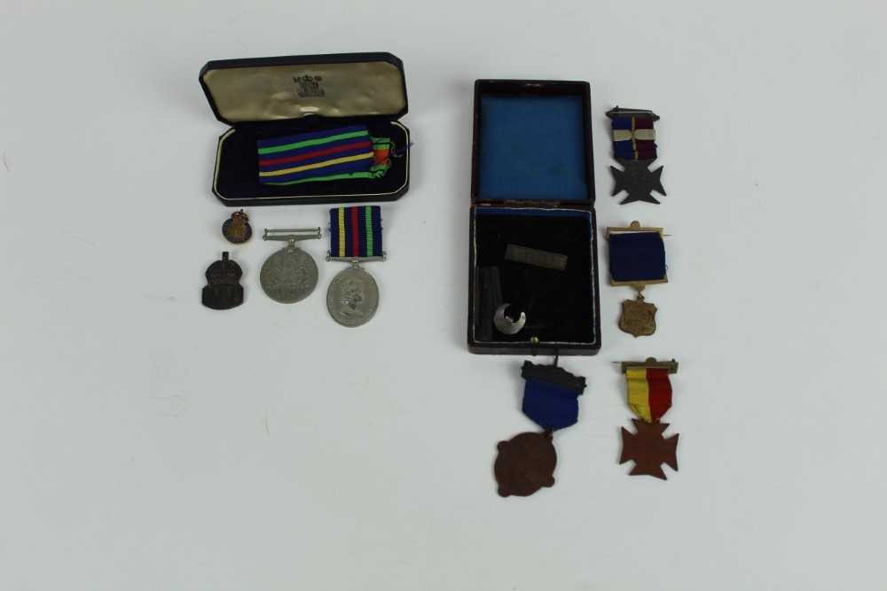 Lot 723 - Second World War Defence medal together with a silver ARP badge, an Elizabeth II Civil Defence Long Service medal in box of issue and a group of Army Temperance medals.