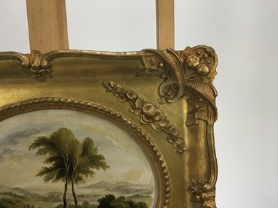 Lot 183 - English School late 19th Century, oil on artist board, An oval of an extensive landscape with cattle near trees in the foreground, in original gilt frame. 19 x 23cm.