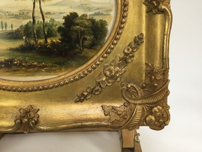 Lot 104 - English School late 19th Century, oil on artist board, An oval of an extensive landscape with cattle near trees in the foreground, in original gilt frame. 19 x 23cm.