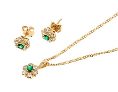 Lot 574 - 18ct gold diamond and emerald flower head cluster pendant on 18ct gold chain, 40cm long, together with a pair matching 18ct gold earrings