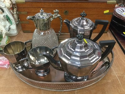 Lot 348 - Silver plated teaset on tray together with a Victorian silver plated and cut glass claret jug