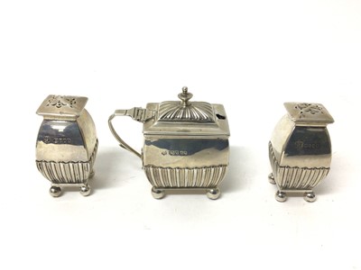 Lot 217 - Victorian silver three piece cruet set